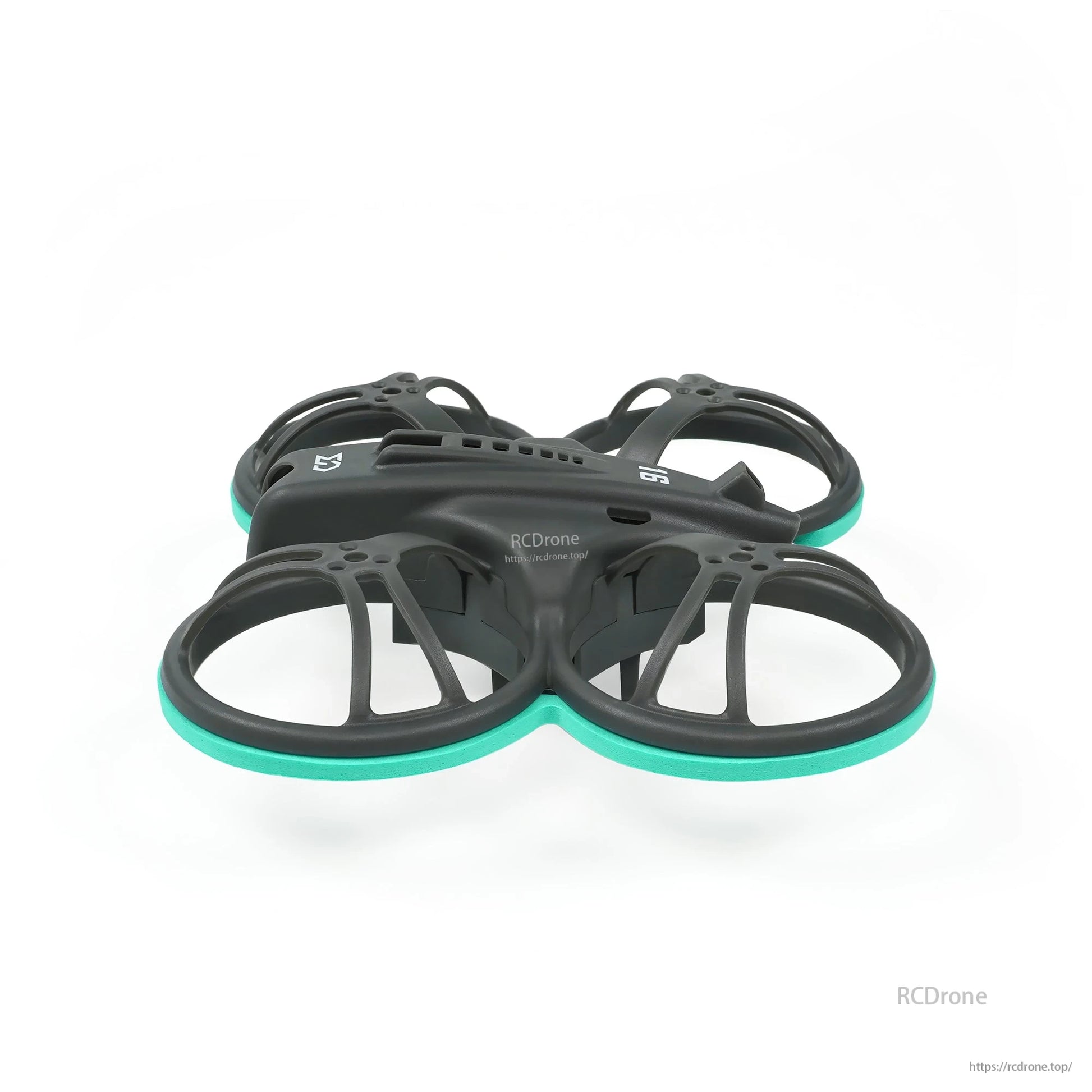 Low side profile of whoop frame showing duct guard depth and teal bumper rings