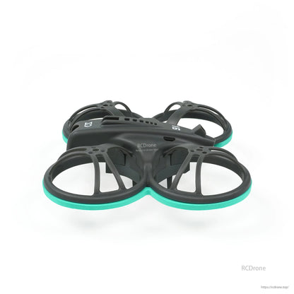 Low side profile of whoop frame showing duct guard depth and teal bumper rings