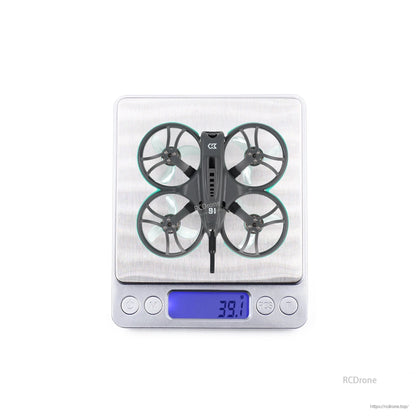 Whoop drone on digital scale showing 39.1 g weight reading