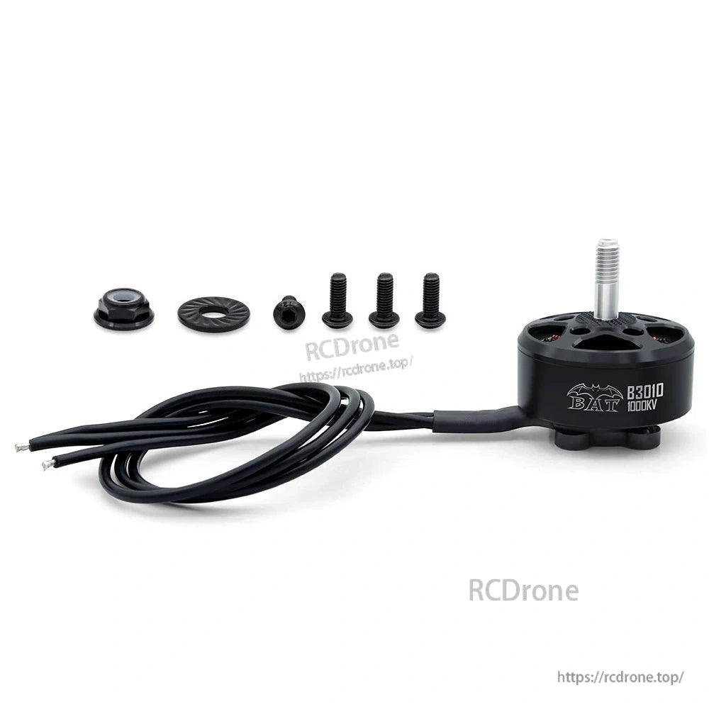 BAT B3010 brushless motor kit laid out with lead wires, prop hardware, and mounting screws