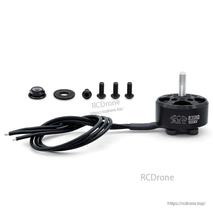 BAT B3010 brushless motor kit laid out with lead wires, prop hardware, and mounting screws