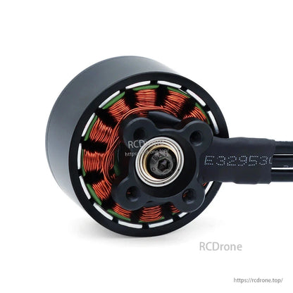Rear view of brushless motor showing exposed copper stator windings and mounting plate