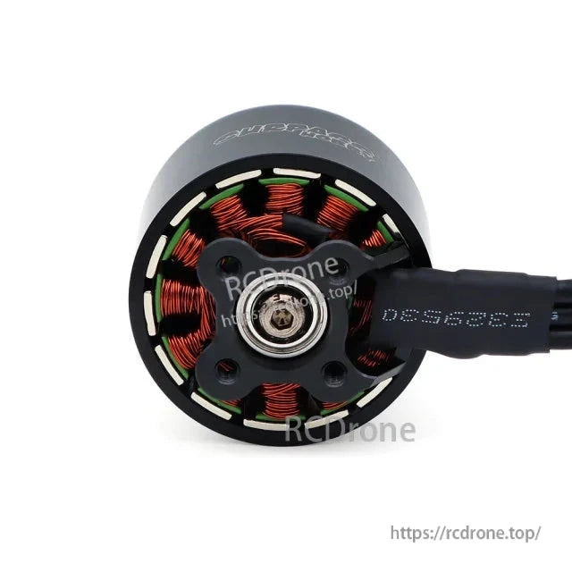 Rear mounting view of brushless motor with exposed copper windings and three-wire cable