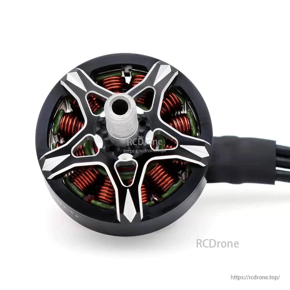 Top close-up of S2306.5 FPV motor with threaded shaft and exposed copper windings