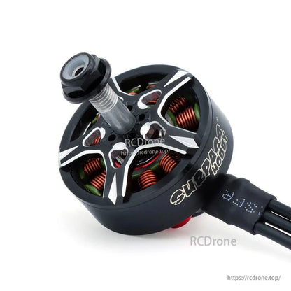 Angled top view of Surpass Hobby motor with three-wire lead and visible stator windings