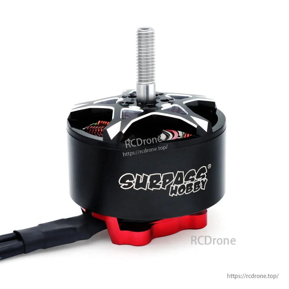Side view showing Surpass Hobby logo on motor can, red base mount, and attached wire lead