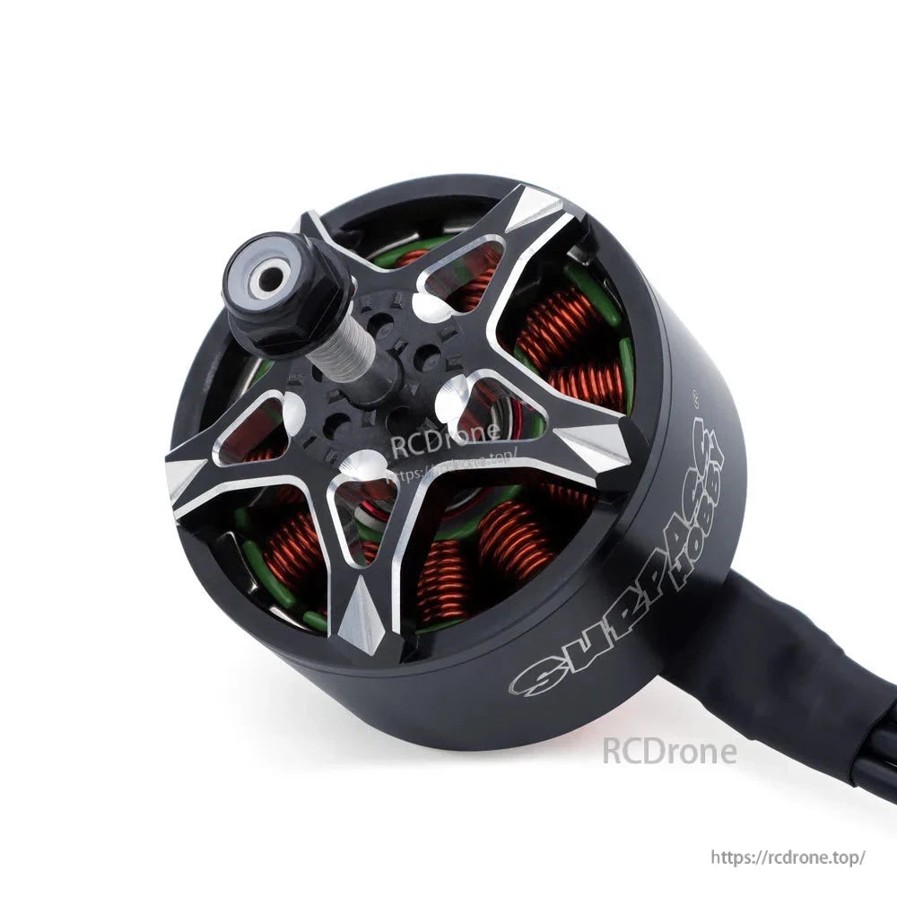 Top angle close-up of BAT S4720 motor bell with star-shaped rotor cap and threaded shaft with nut
