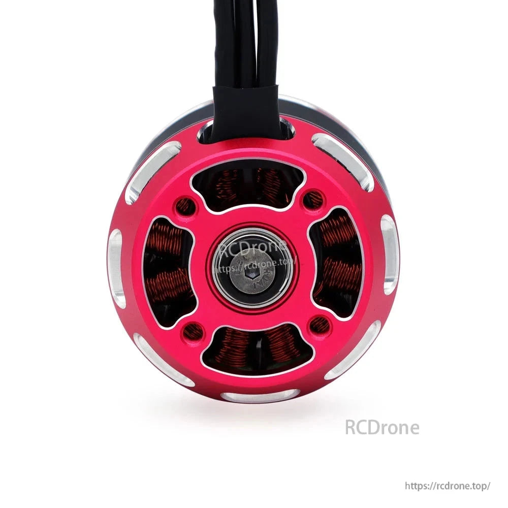 Surpass Hobby F5055 brushless motor bottom view showing copper windings and ventilation cutouts