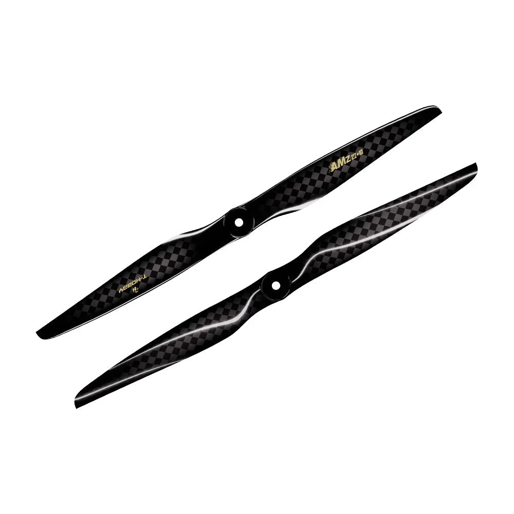 Pair of T-HOBBY AMZ 22x10 carbon fiber propeller blades with checker pattern and center mounting holes