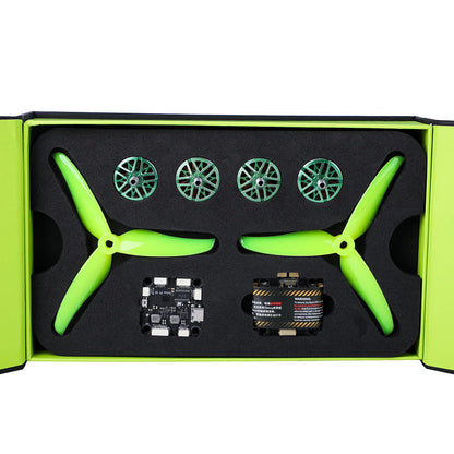 T-Motor drone kit in foam case with two green 3-blade propellers, four motor tops, and two circuit boards