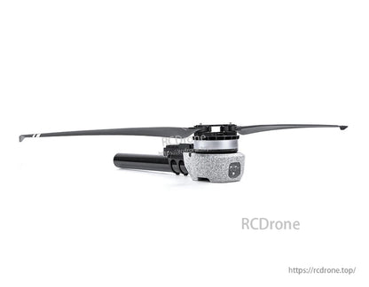 T-Motor drone motor with long propeller mounted on a carbon fiber boom and silver housing, side view