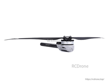 T-Motor brushless drone motor with long black propeller blade attached, side view with silver housing