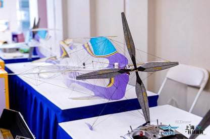 T-Motor carbon-fiber propeller mounted on a lightweight indoor model aircraft with wire frame and fabric wing