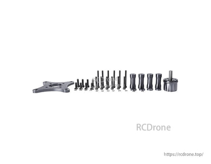 T-Motor mounting hardware kit with metal plate, assorted screws, standoffs, and a small motor component