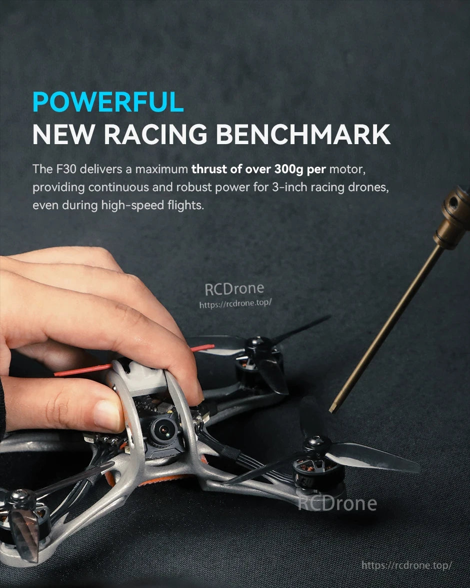 Hand adjusting a 3-inch FPV racing quad with T-Motor F30 motor promo text noting over 300g thrust per motor