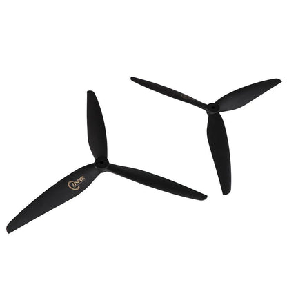T-Motor CINE 3-Blade FPV Propeller, Two black T-Motor CINE 3-blade FPV drone propellers with central mounting hub on a white background
