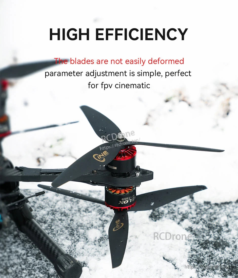 Close-up of a black T-Motor CINE 3-blade FPV propeller mounted on a red brushless motor