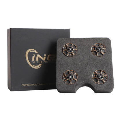 Four black and gold T-Motor components in a foam tray next to a branded box