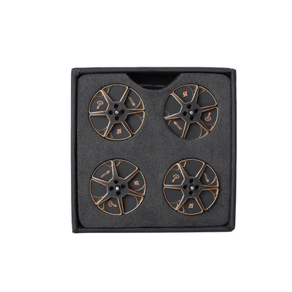 Set of four T-Motor black and copper motor bell tops packed in a foam-lined box