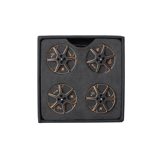 Set of four T-Motor black and copper motor bell tops packed in a foam-lined box