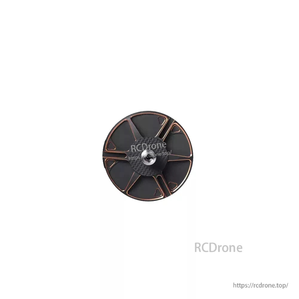 Top view of a black T-Motor brushless drone motor rotor with copper accents and a central shaft