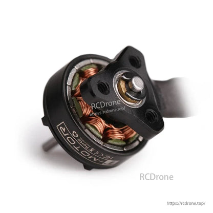 Close-up of a T-Motor brushless drone motor with copper windings and a mounted propeller hub