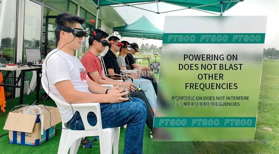 T-Motor FT800 5.8GHz VTX feature graphic with FPV pilots and text about not blasting other frequencies on power-up