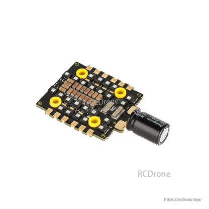 T-Motor MINI 20x20 4-in-1 FPV drone ESC board with yellow mounting grommets and attached capacitor
