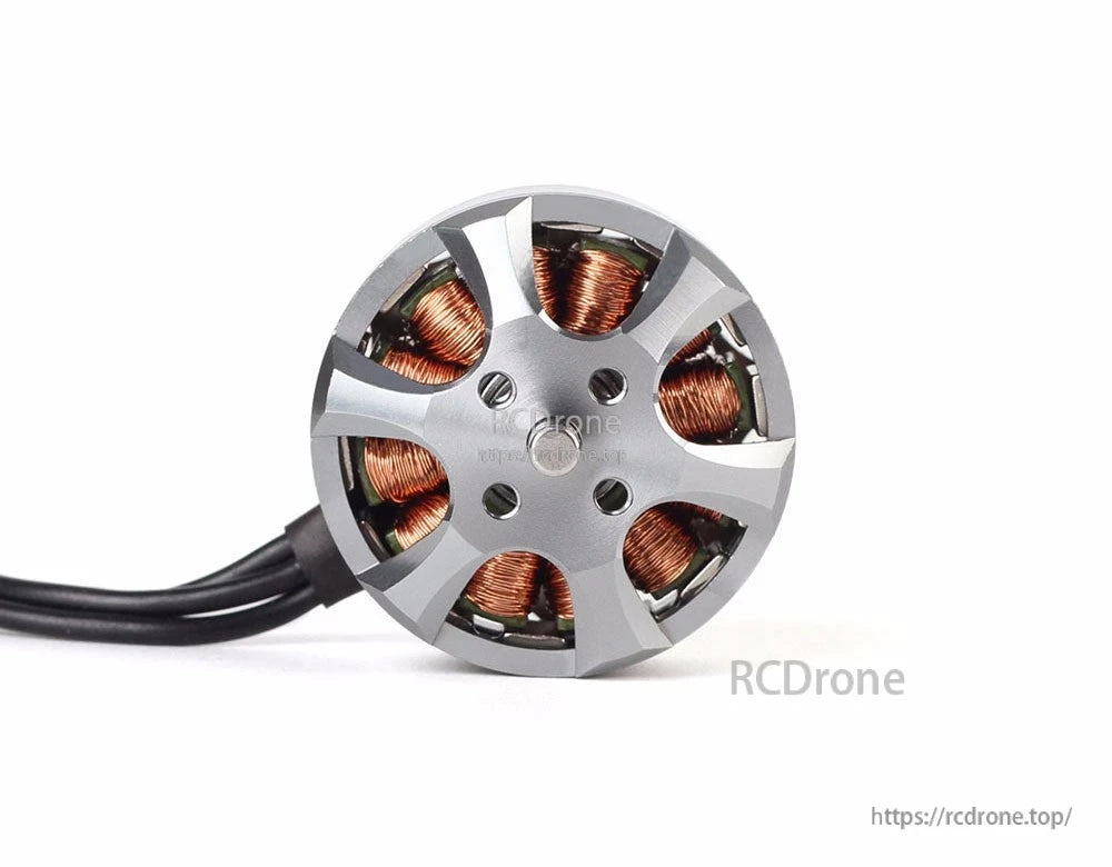 T-Motor brushless outrunner motor close-up with silver end bell, visible copper windings, and three black wires