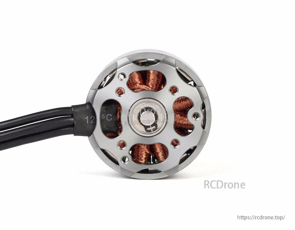 T-Motor brushless outrunner motor close-up with silver housing, visible copper windings and attached lead wires