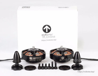 Two T-Motor MN4006-23 KV380 brushless drone motors with prop adapters, mounting plates, and screws