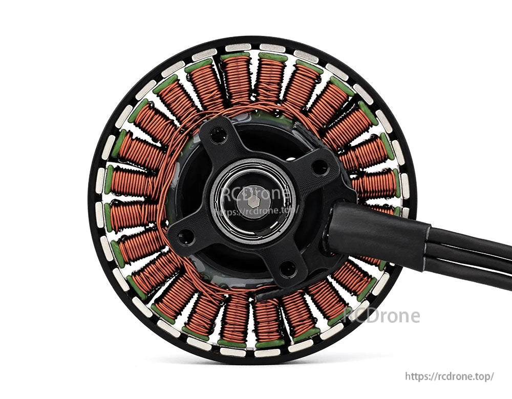 Close-up of a T-Motor brushless drone motor stator with copper windings, central hub, and lead wires