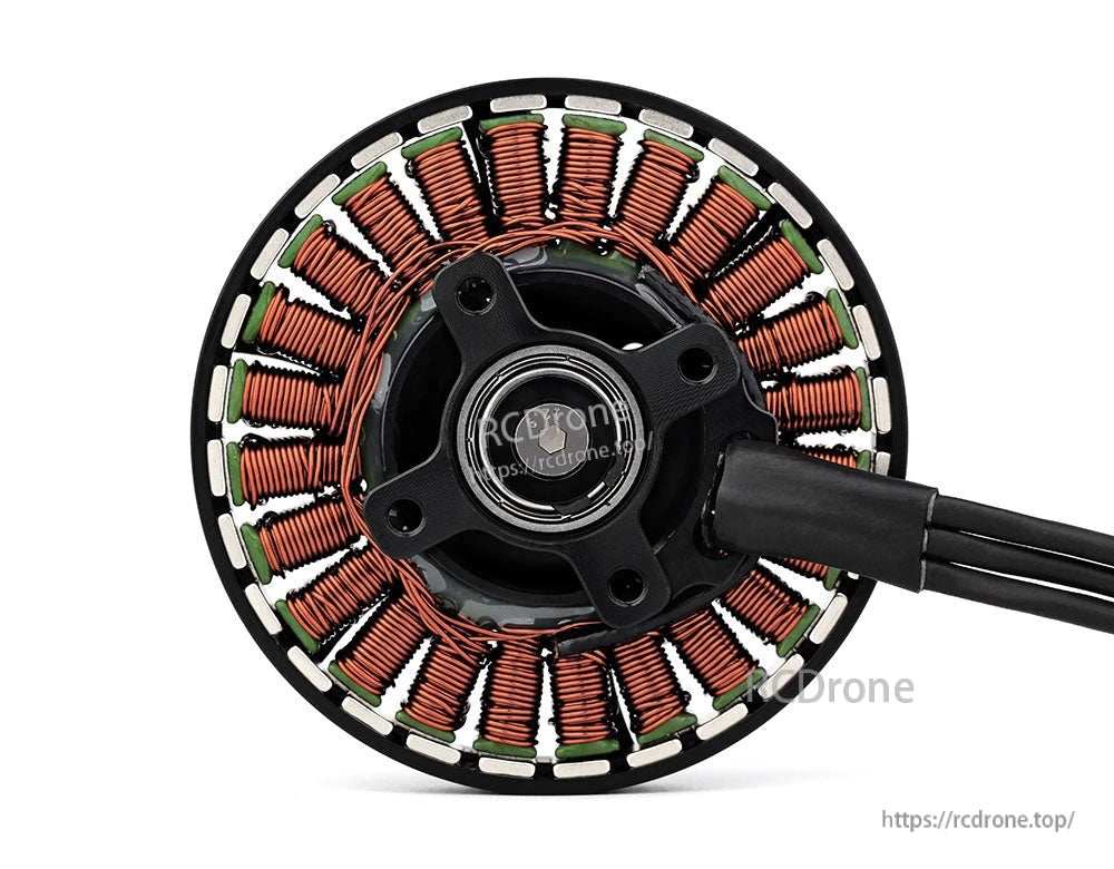 Close-up of a T-Motor brushless motor stator with copper windings, central mount hub, and three-wire lead.
