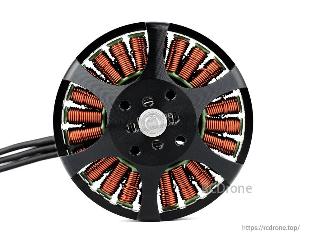 Top view of a T-Motor brushless drone motor with exposed copper windings, mounting holes, and lead wires
