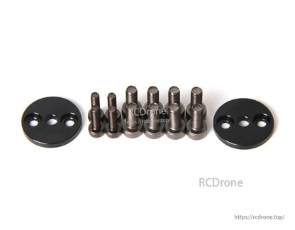 T-Motor mounting hardware kit with two black three-hole round plates and a set of metal screws