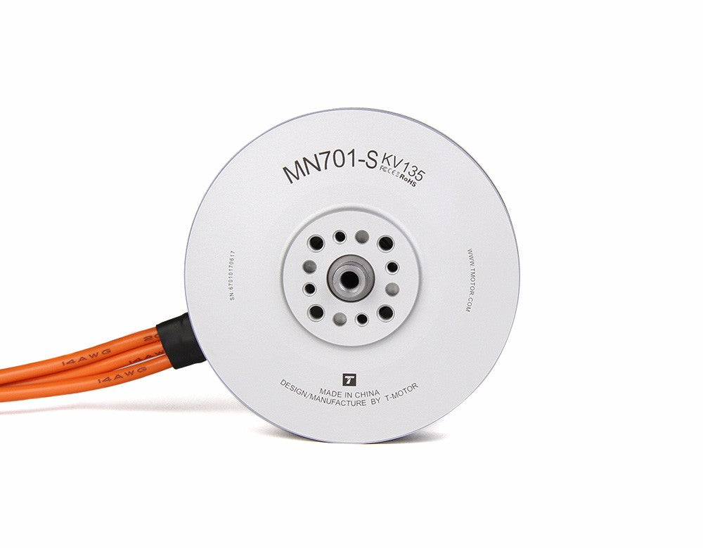 Top view of T-Motor MN701-S KV135 brushless motor with centered mounting hub and orange 14AWG leads
