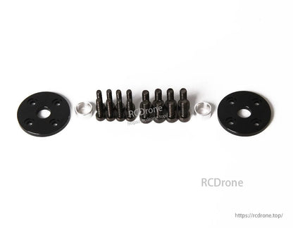 T-Motor mounting hardware kit with two round black plates, screws, and two metal spacers on white background
