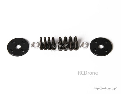 T-Motor mounting hardware kit with two round black plates, assorted black screws, and two silver spacers