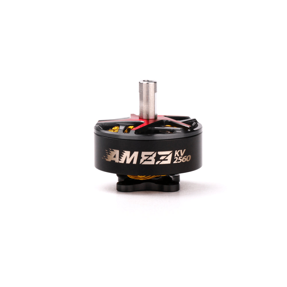 T-Motor AM series brushless drone motor with 2560KV marking, black can, red spokes, and steel shaft
