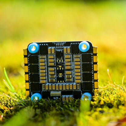 T-Motor P60A V2 4in1 ESC, T-Motor P60A V2 4-in-1 FPV drone ESC board with blue soft mounts, square PCB and solder pads