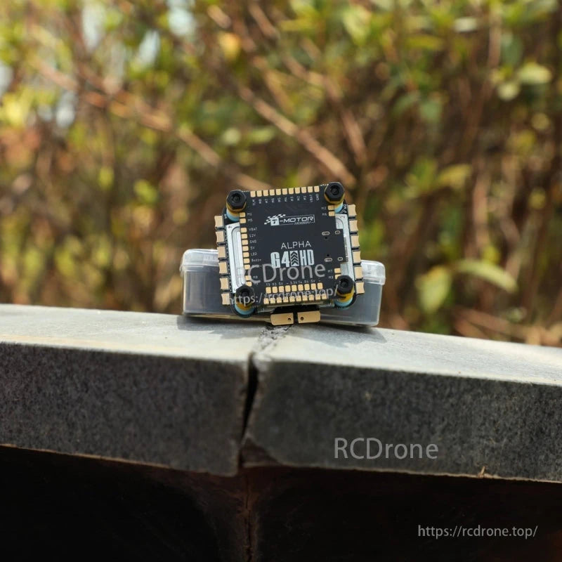 T-Motor Pacer Alpha G4 flight controller board with four mounting holes and side solder pads/connectors