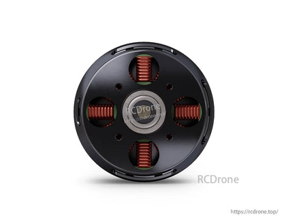 T-Motor brushless drone motor close-up showing the bottom plate, exposed copper windings, and center bearing