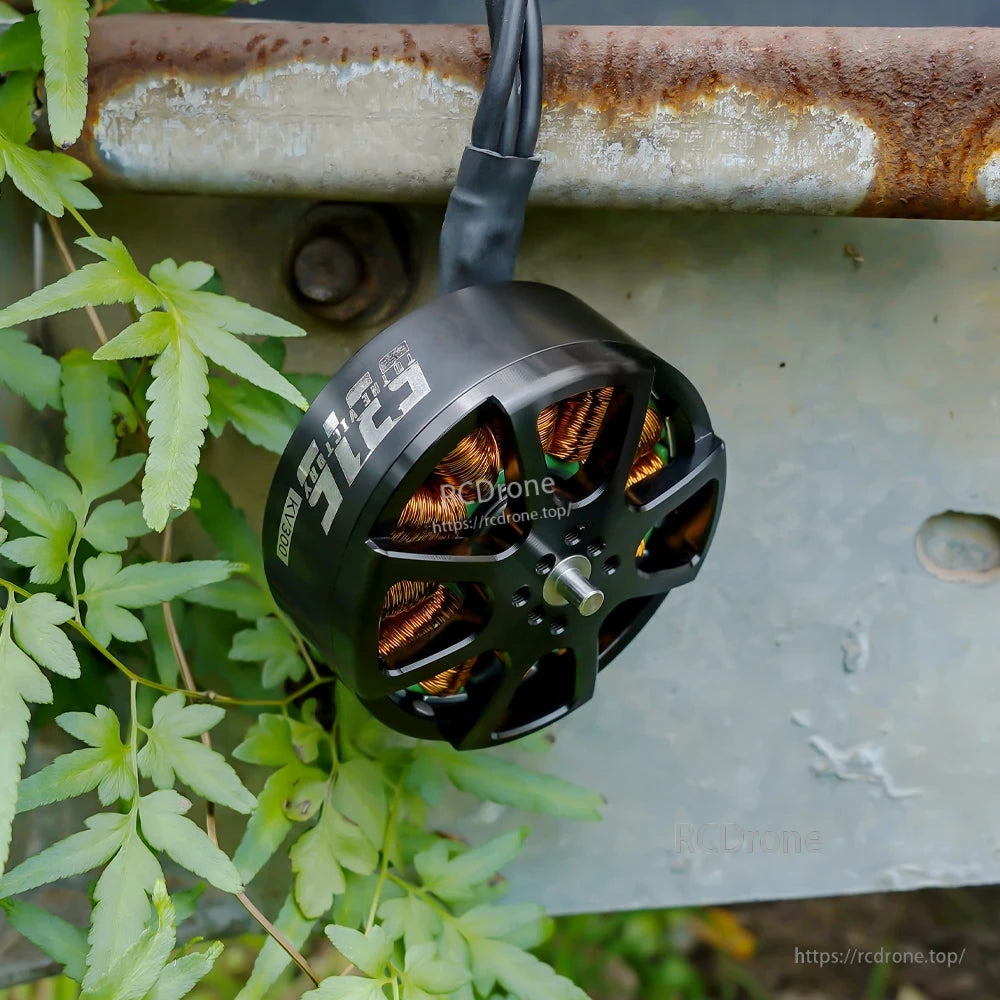 T-Motor brushless outrunner motor with black housing, exposed copper windings, and three-wire lead (KV500).