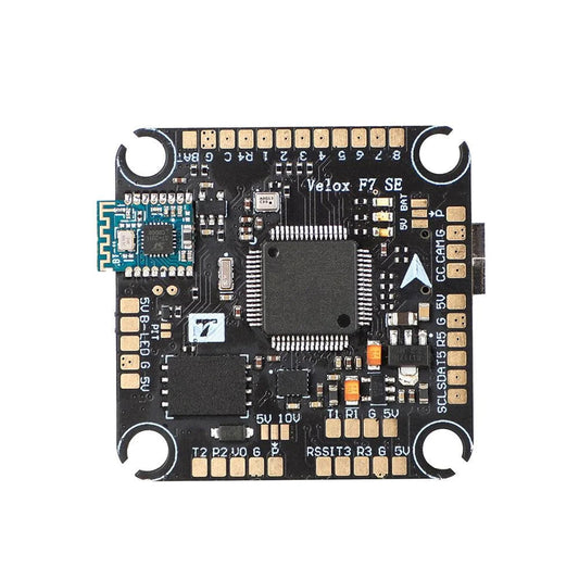T-Motor Velox F7 SE flight controller board with integrated Bluetooth module and labeled solder pads