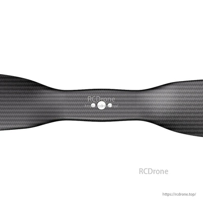 T-Motor VZ20x8.2 20in VTOL Propeller, Close-up of T-Motor VZ20x8.2 20-inch VTOL propeller blade with carbon-fiber weave and center mounting holes