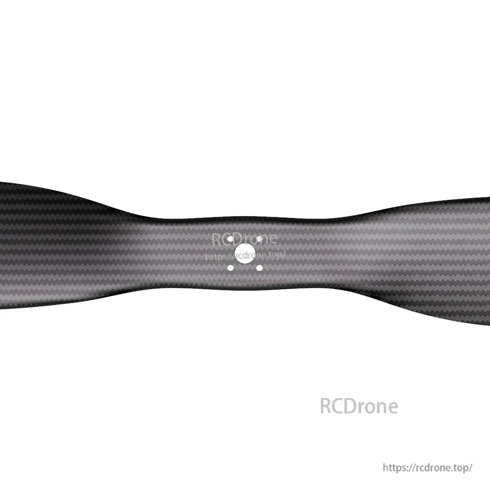 Close-up of a matte carbon fiber VTOL propeller blade with woven finish and flange-mount bolt holes