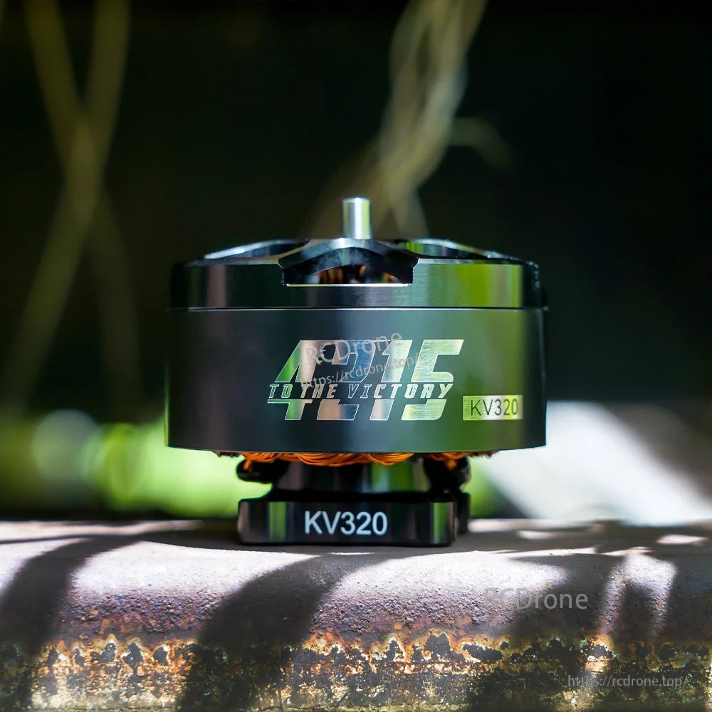 Close-up of T-Motor brushless drone motor with FIRE branding and KV320 marking on the can