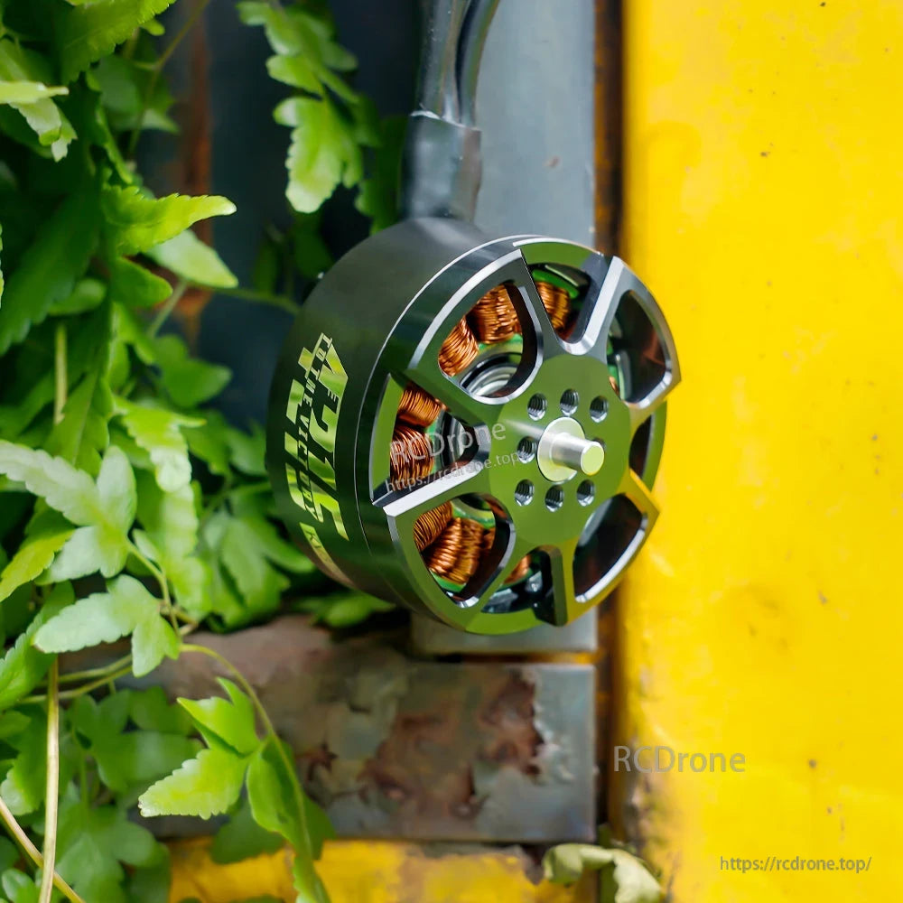 T-Motor brushless drone motor with open aluminum bell, visible copper windings and front mounting hub