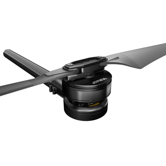 Close-up of a T-Motor drone motor with two-blade propeller mounted on a carbon fiber arm