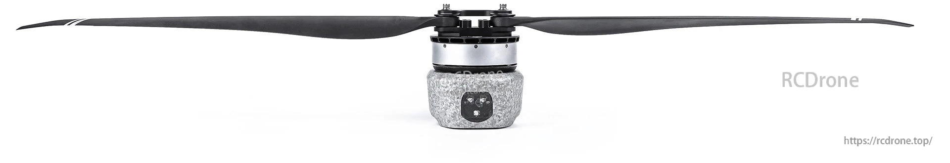 T-Motor brushless drone motor with mounted black propeller on a silver housing and gray base